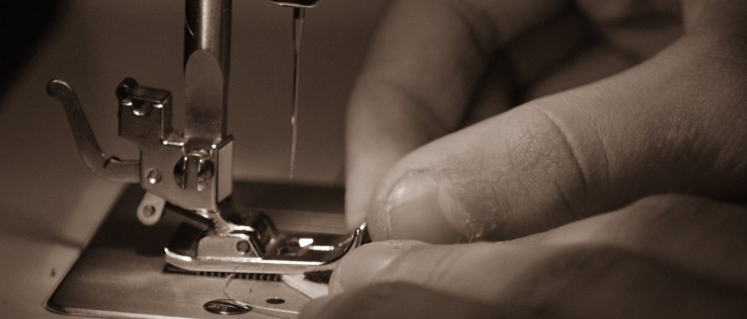 ethical clothing production hands sewing