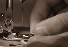 ethical clothing production hands sewing