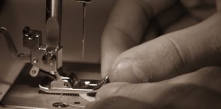ethical clothing production hands sewing